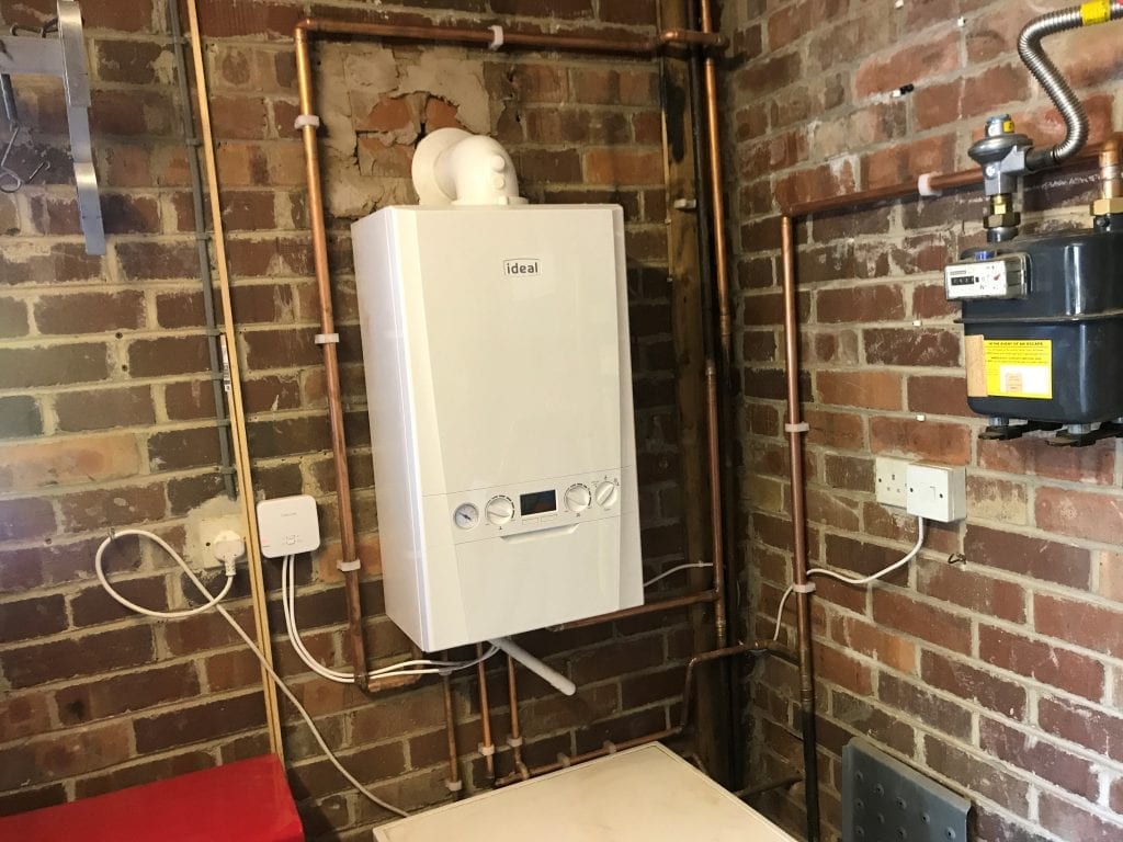 White Ideal logic combi boiler installed in Huddersfield Milnsbridge